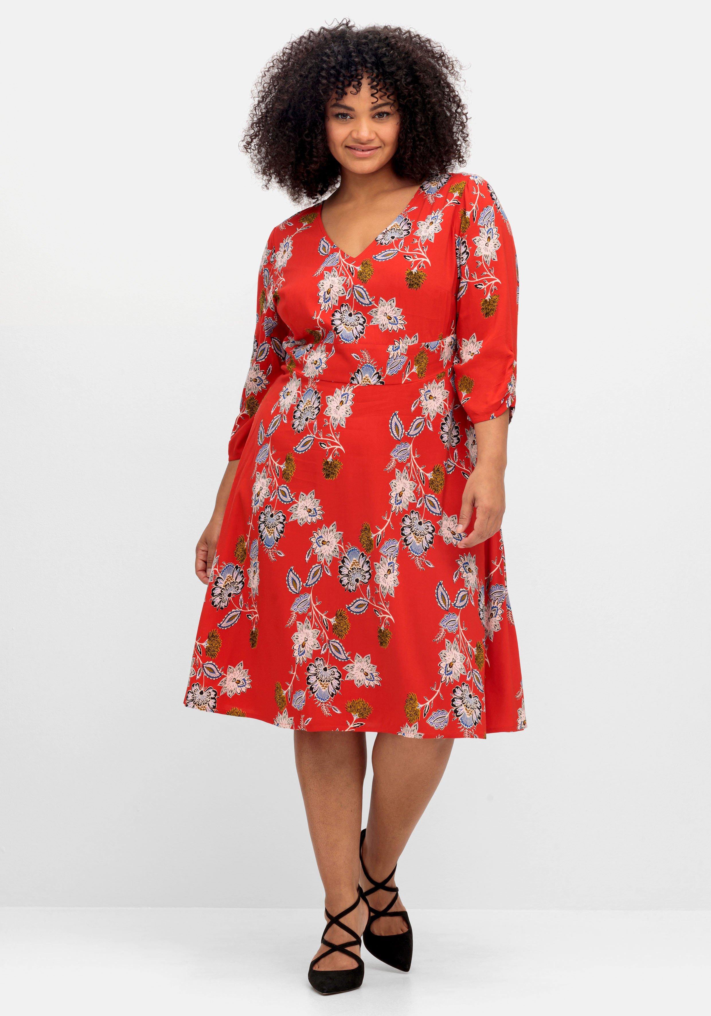 Kleid mit Blumenprint und Taillenband vorn