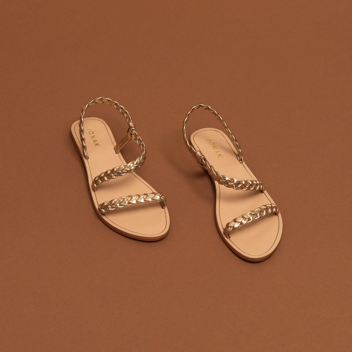 Sandales à brides tressées  en cuir métallisé or