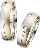 Trouwringen geel en witgoud met Diamant breedte 5,5 mm