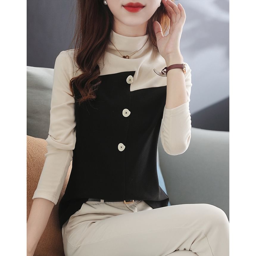 Jeonseon - Blouse met lange mouwen en mockneck en tweekleurige knopen