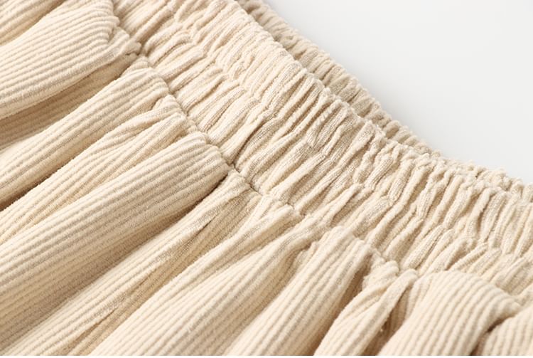 CosmoCorner - Corduroy cropped harembroek met elastische taille en bloemenborduursel