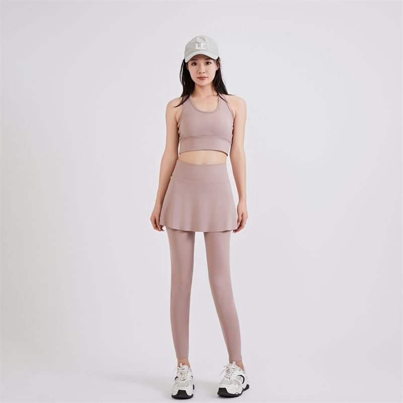 KUMI - Set: Sportieve effen bh-top + yogabroek met hoge taille en rokoverlay