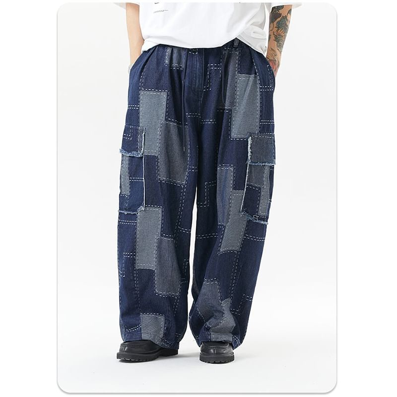Adotuastic - Laag uitgesneden patchwork cargojeans met wijde pijpen