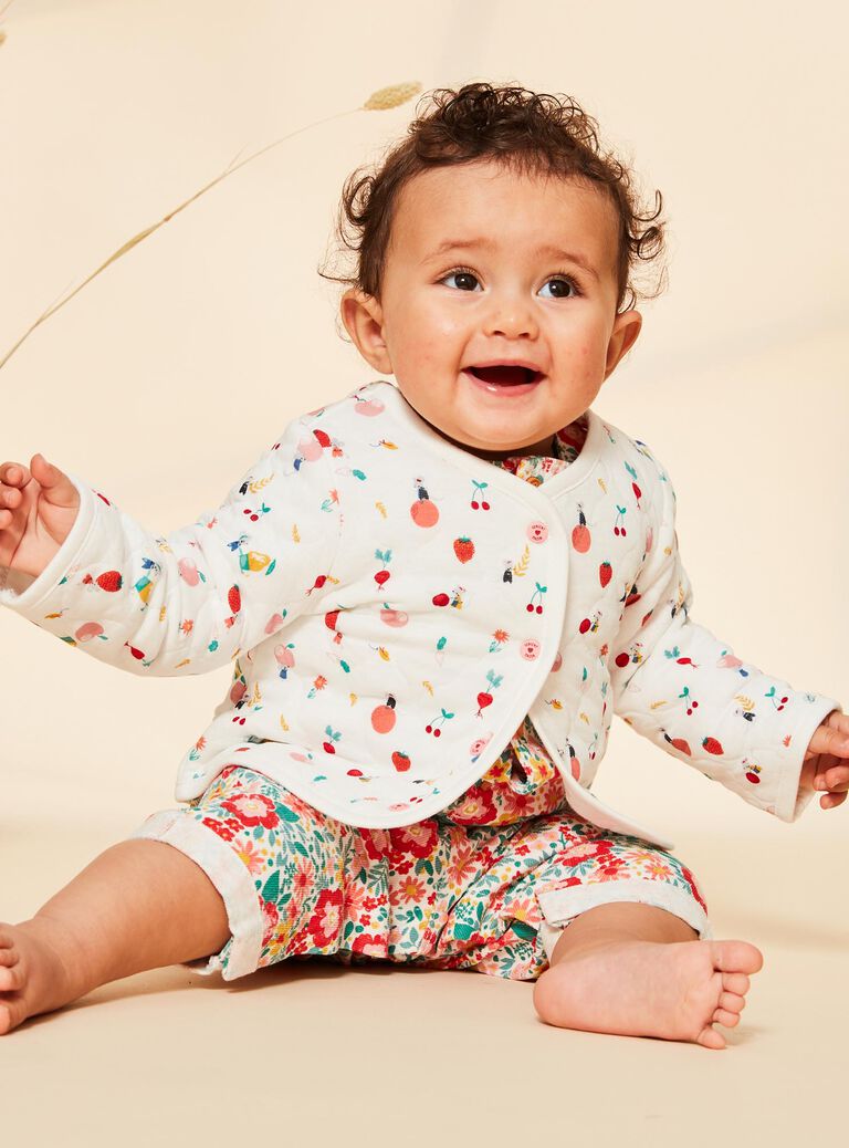Gilet en tubique écrue avec surpiqures