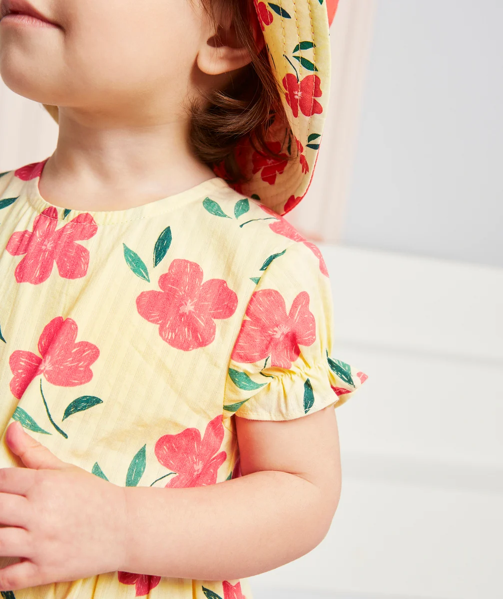 ROBE BÉBÉ FILLE JAUNE EN COTON IMPRIMÉE AVEC FLEURS