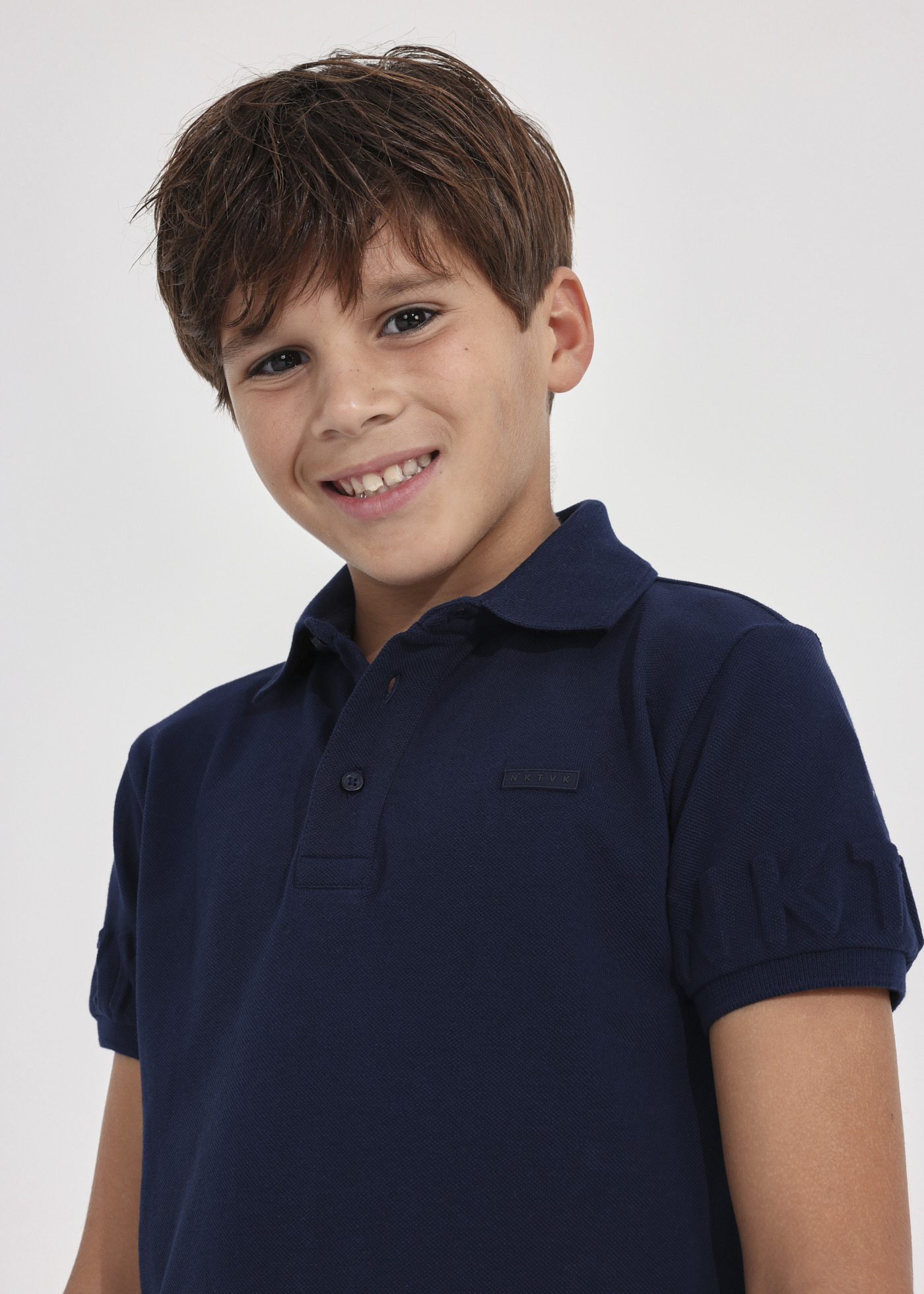 Camisa polo de algodão sustentável para meninos