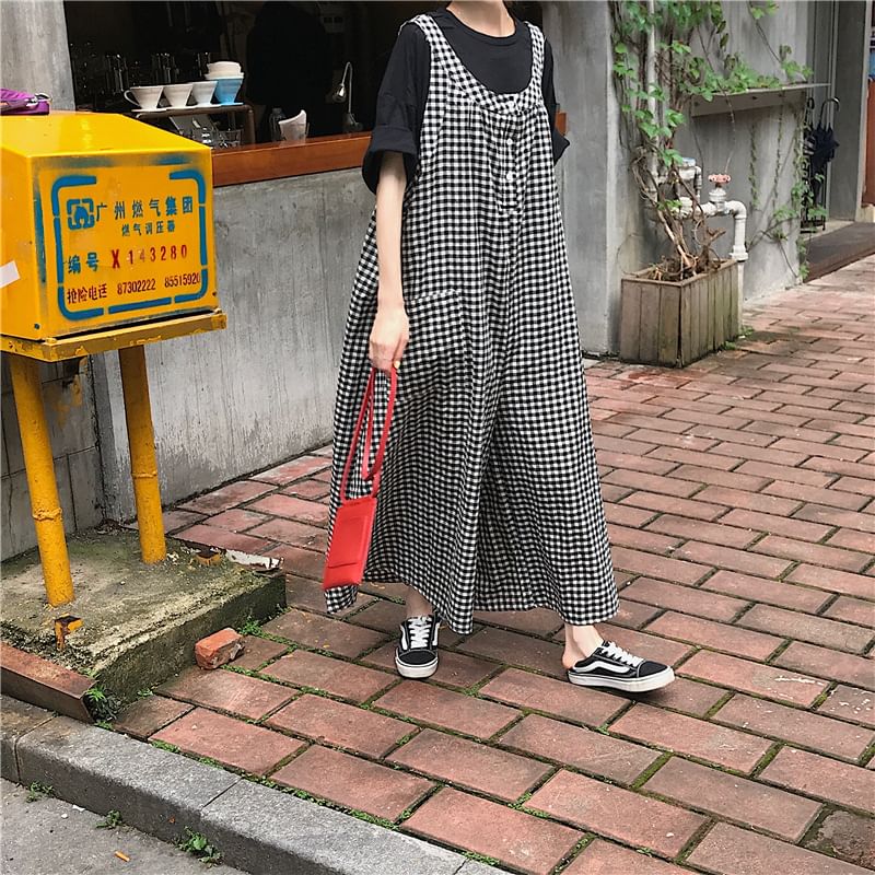 INEN - Mouwloze geruite jumpsuit met wijde pijpen