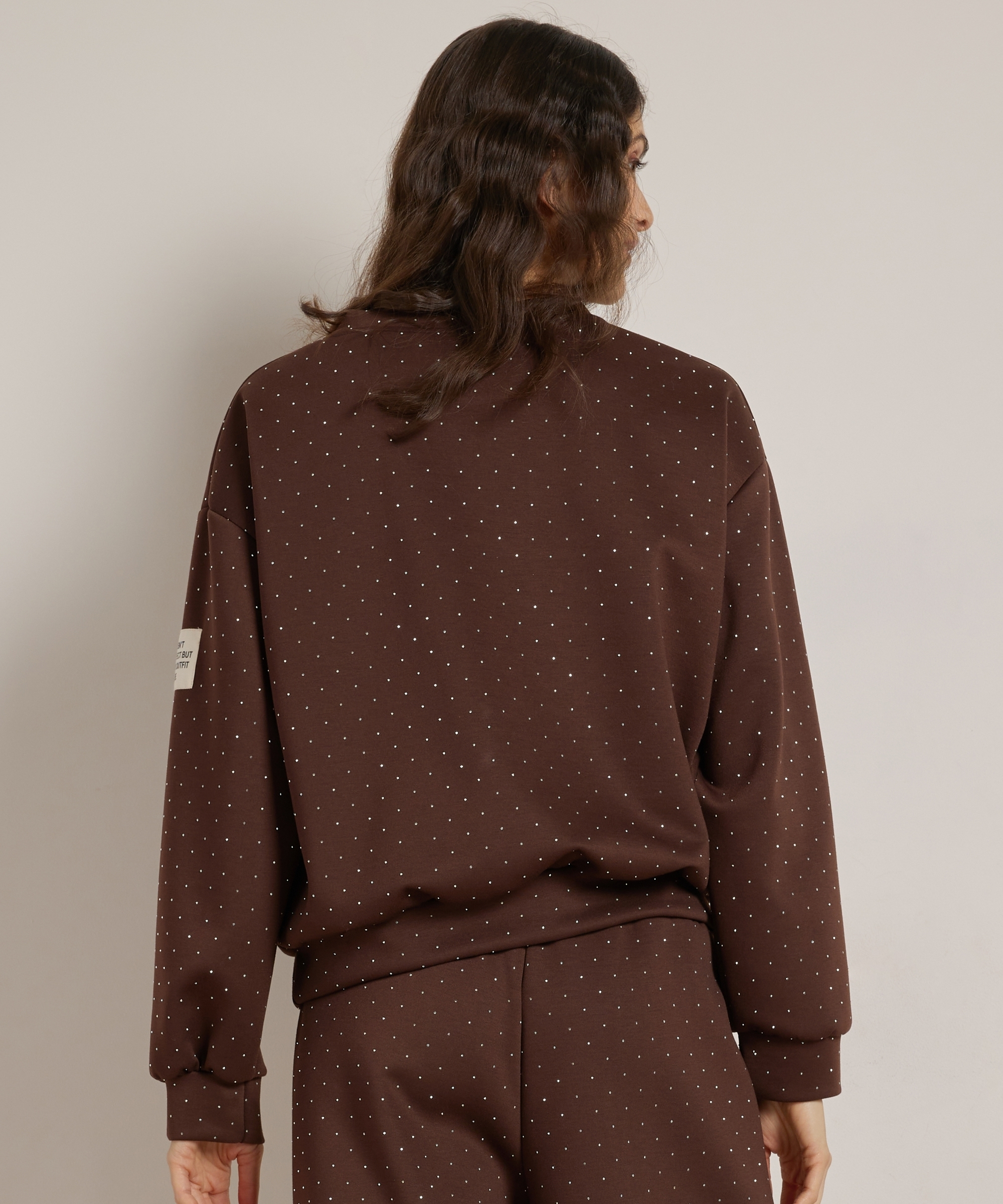 glitter trui mouwlabel