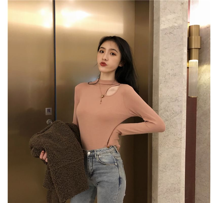 Shinsei - T-shirt met lange mouwen en een getailleerd model en effen uitsnijdingen