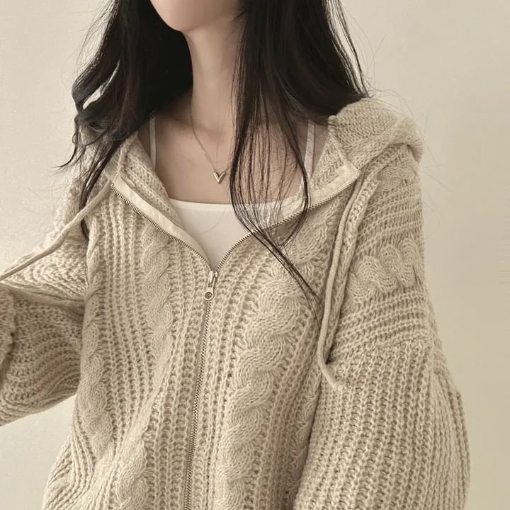MIKIGA - Oversized kabelgebreide hoodie met rits