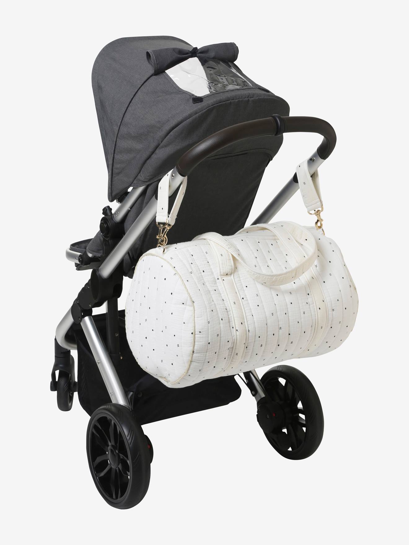 Bolsa de maternidade Baby Roll em gaze de algodão branca tamanho médio com estampa.