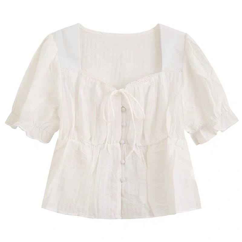 minaga - Effen blouse met kanten rand en pofmouwen