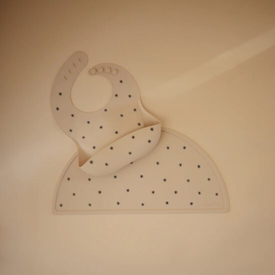 Bavoir en silicone   Black Daisy        de               mushie