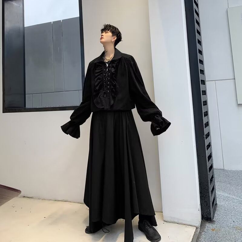 JUN.LEE - Pofmouw effen geplooid veterblouse