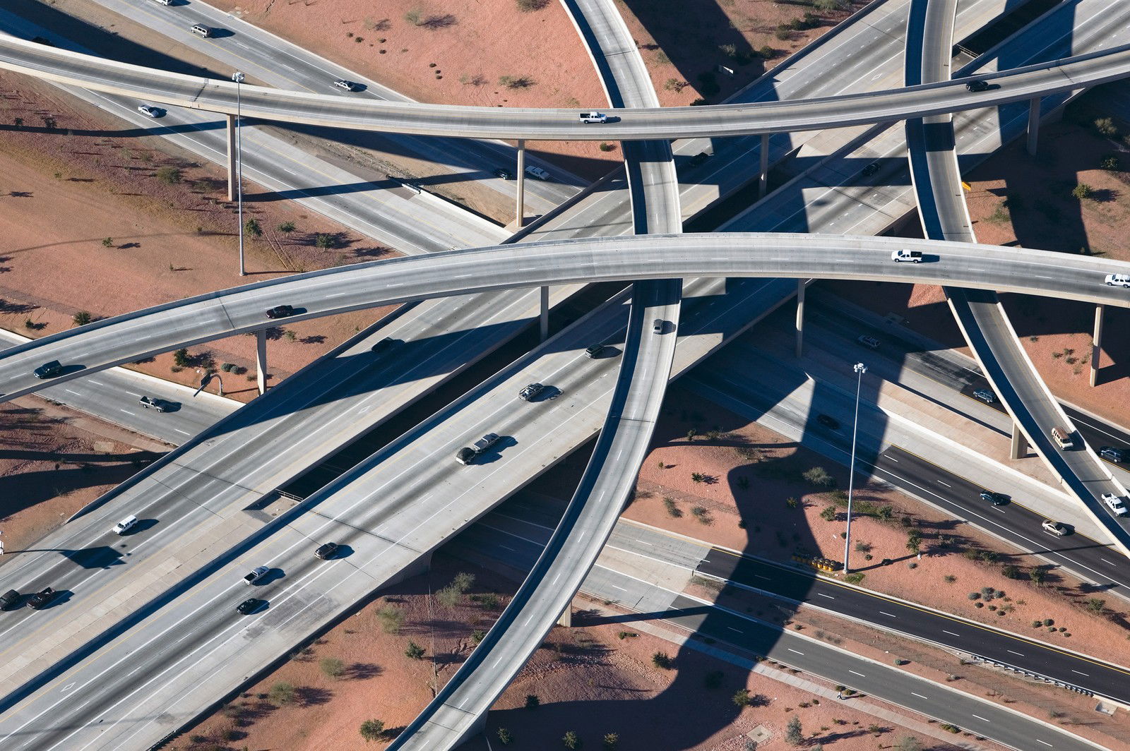 Crisscrossed Highway interchange, Phoenix, Arizona by Alex Maclean - Limited Edition. Edition of: 100. Signed.