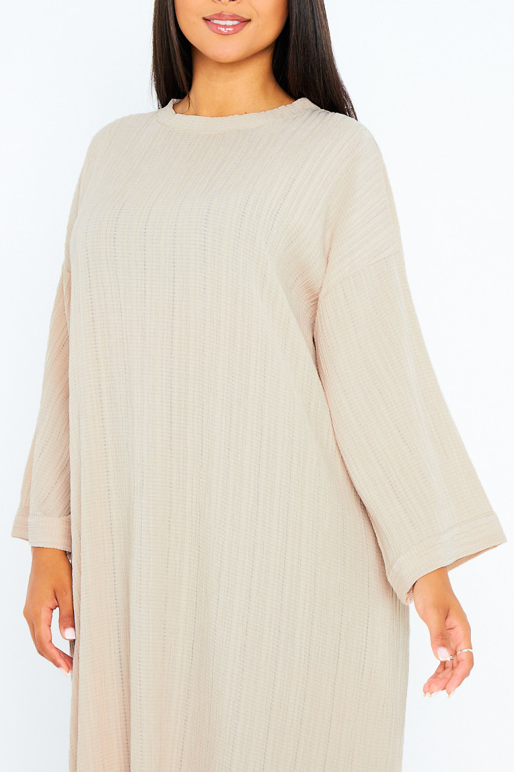 Robe beige longue à couture en relief
