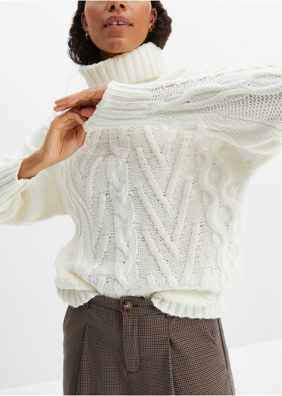 Pull à col roulé et torsades