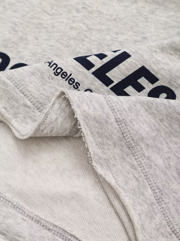 Avauntgardo - 3/4-mouw ronde hals sweatshirt met opdruk en trekkoord in de taille, gestreepte shorts met wijde pijpen / set