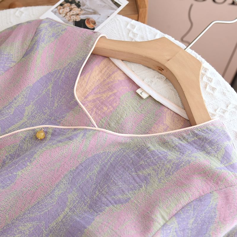 Somnus - Asymmetrische midi-slaapjurk met lange mouwen en print en knopen