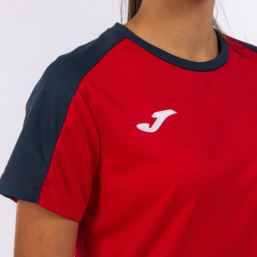 Camiseta Joma Eco Championship de manga curta, azul marinho e vermelha.