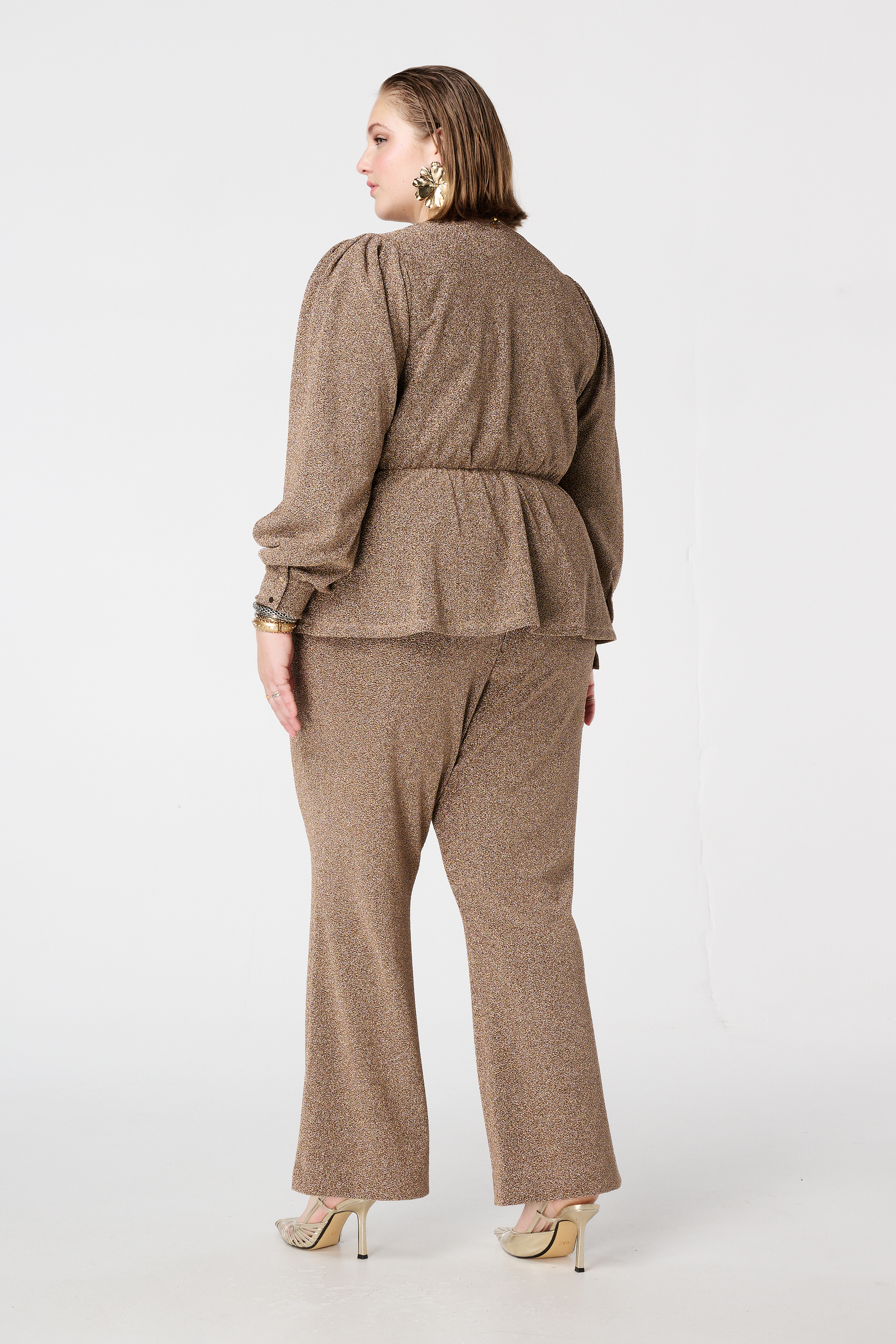 Glitter pantalon met flared pijpen bronze