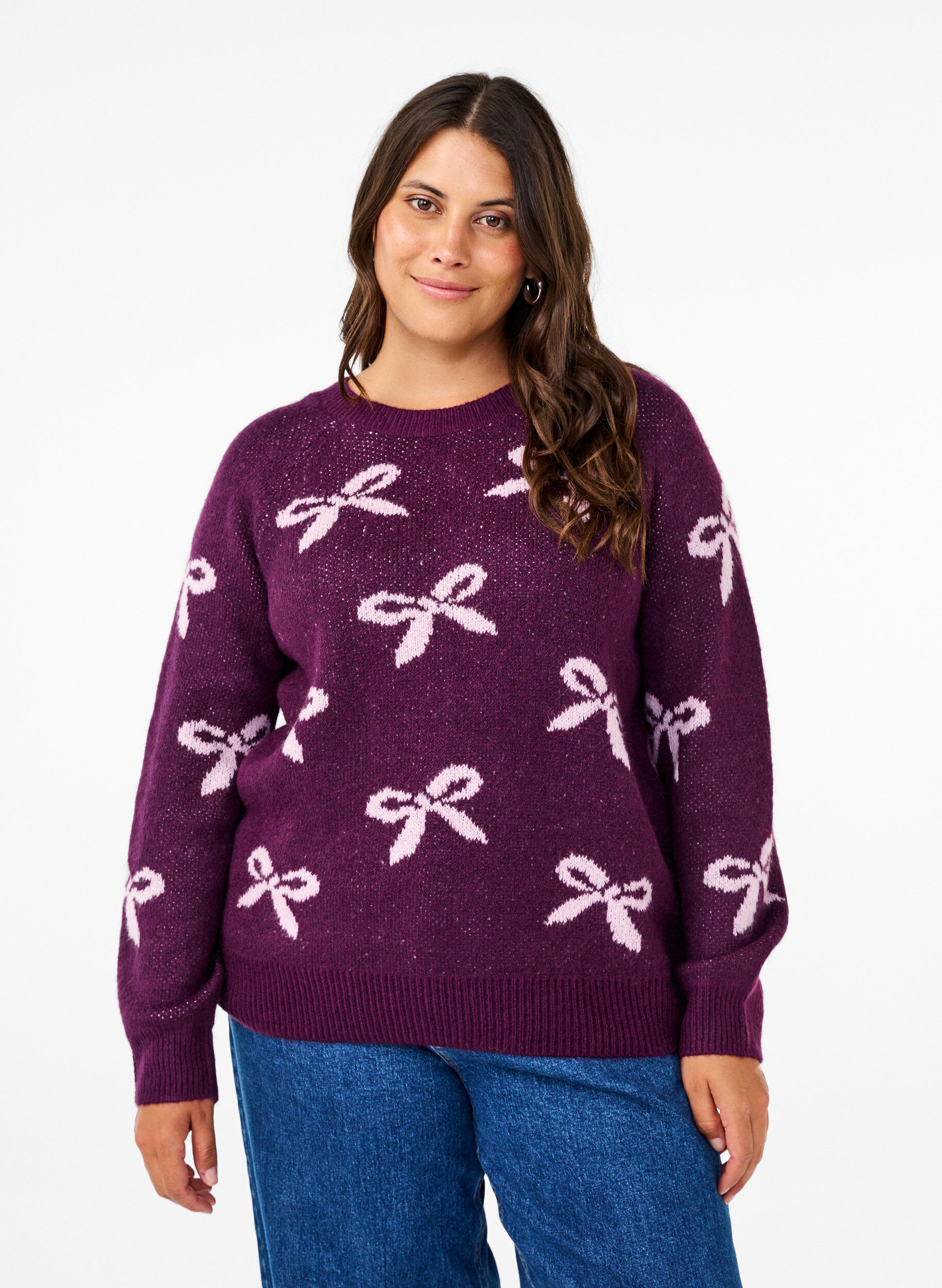 Strikbluse med sløjfer