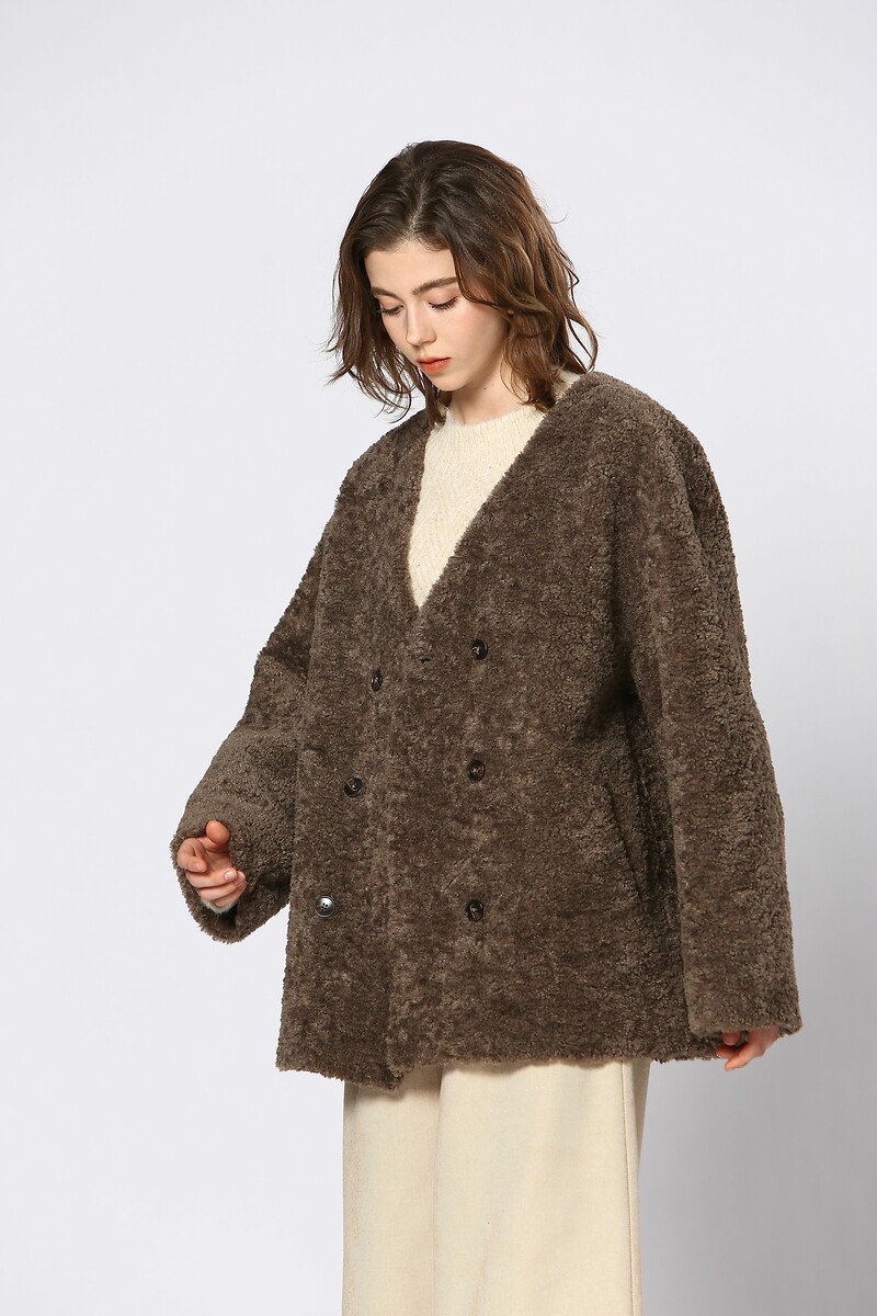 ATÉ BREVE<br>Casaco sherpa de comprimento médio