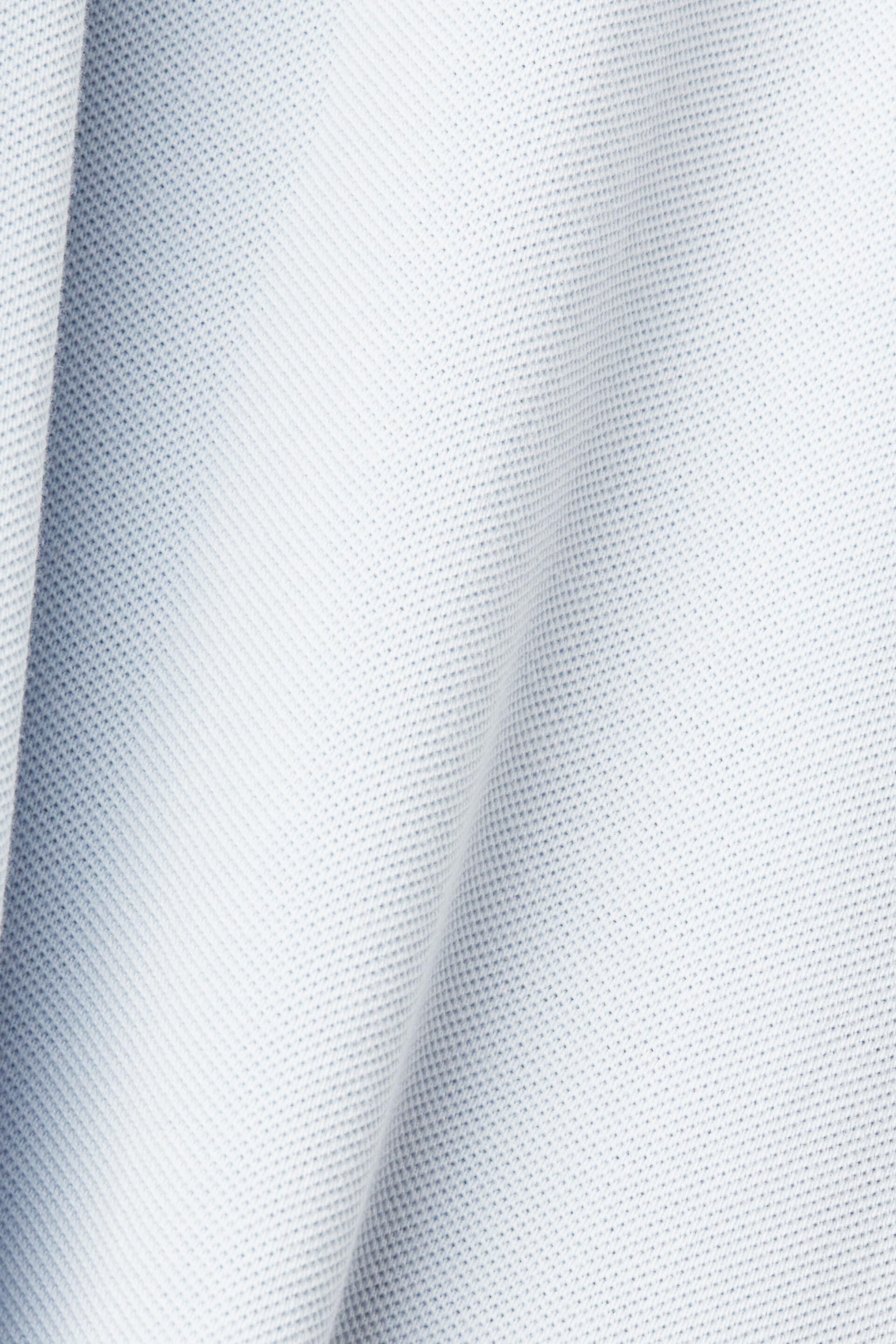 Polo en maille piquée de coton, au délavage Stone washed