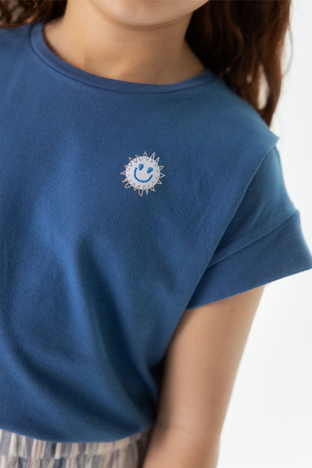 Blauw T-shirt met geplooide details