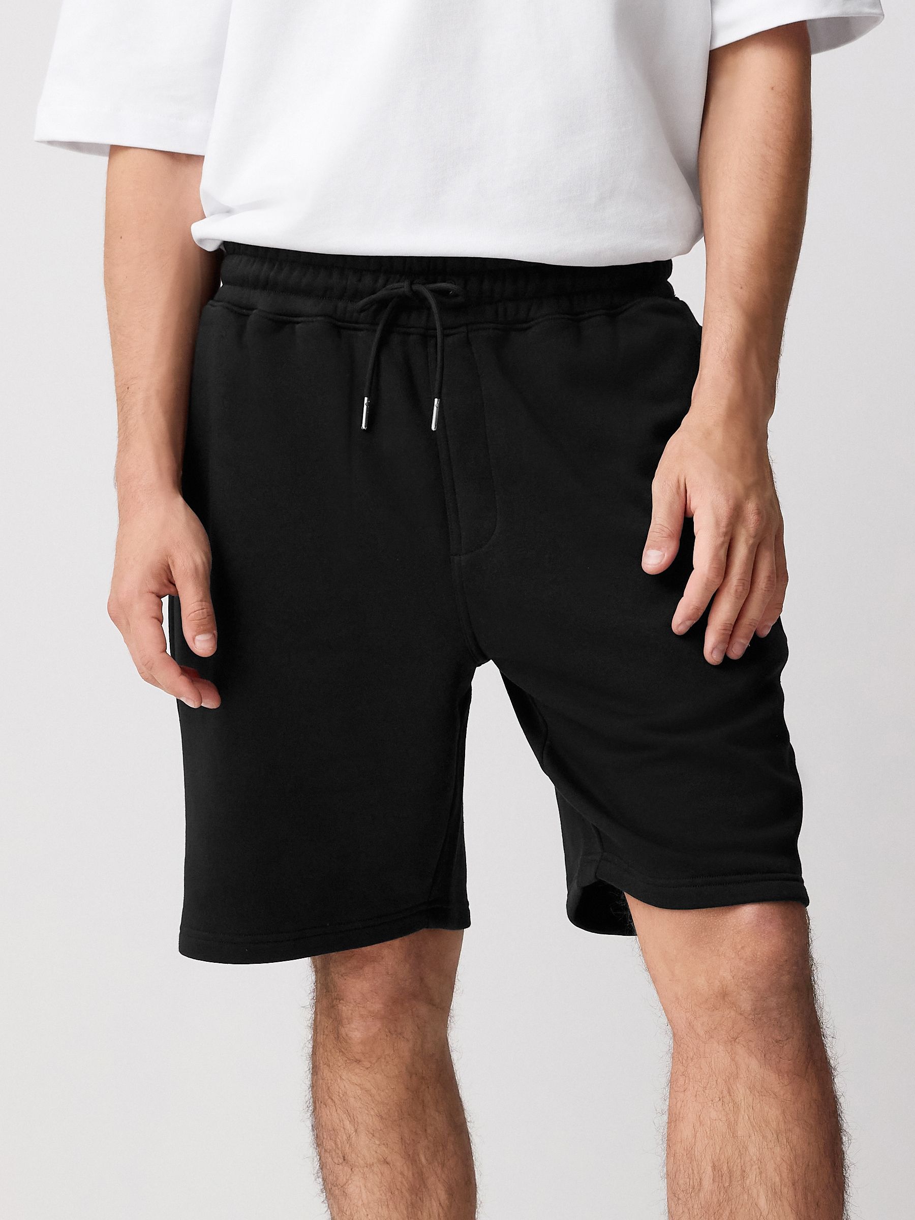 Zwart - Geborstelde jersey shorts met ritszakken