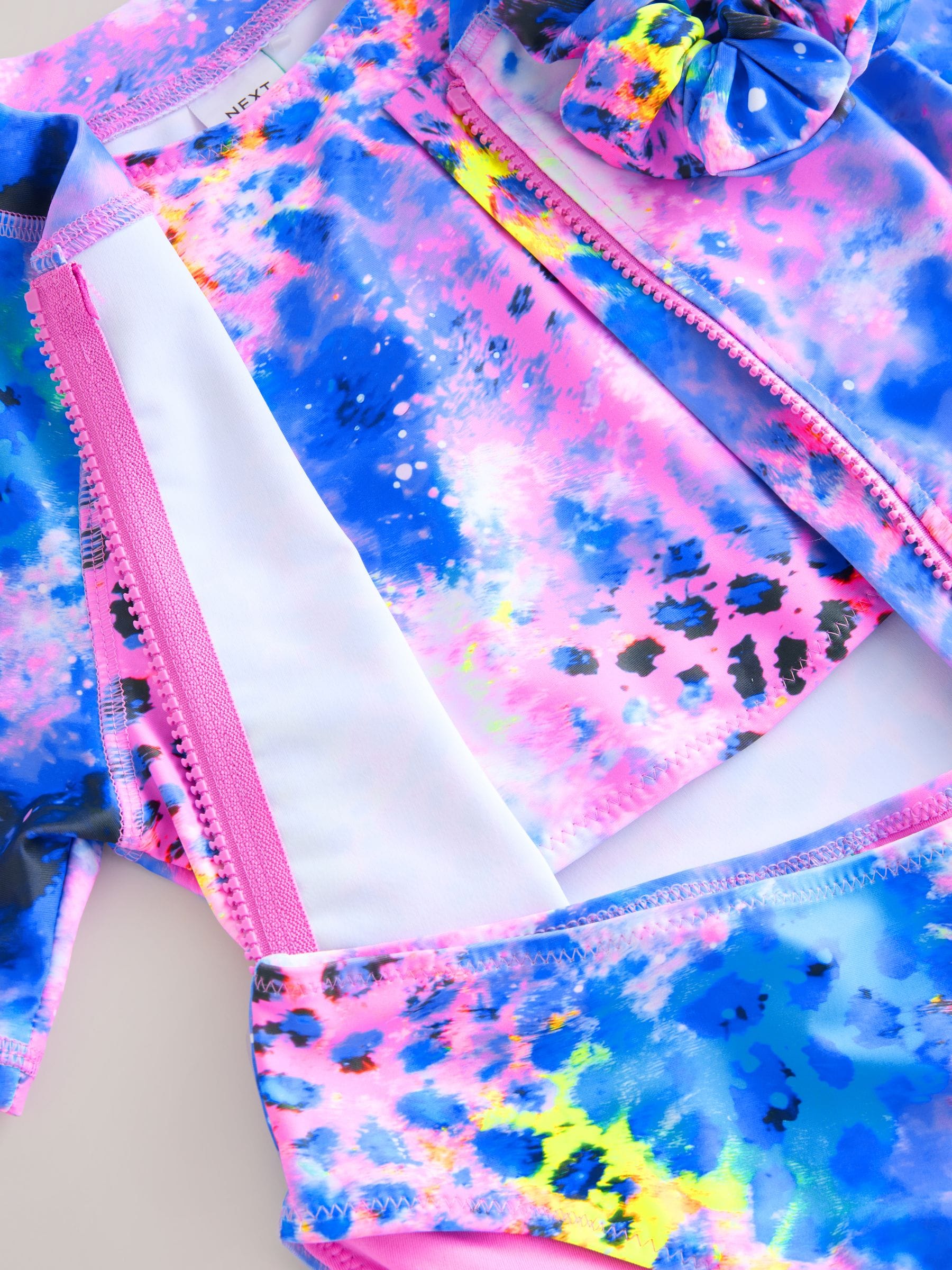 Paars met dierenprint - Bikini, surfhemdje en scrunchie zwemset (3 - 16 jr)