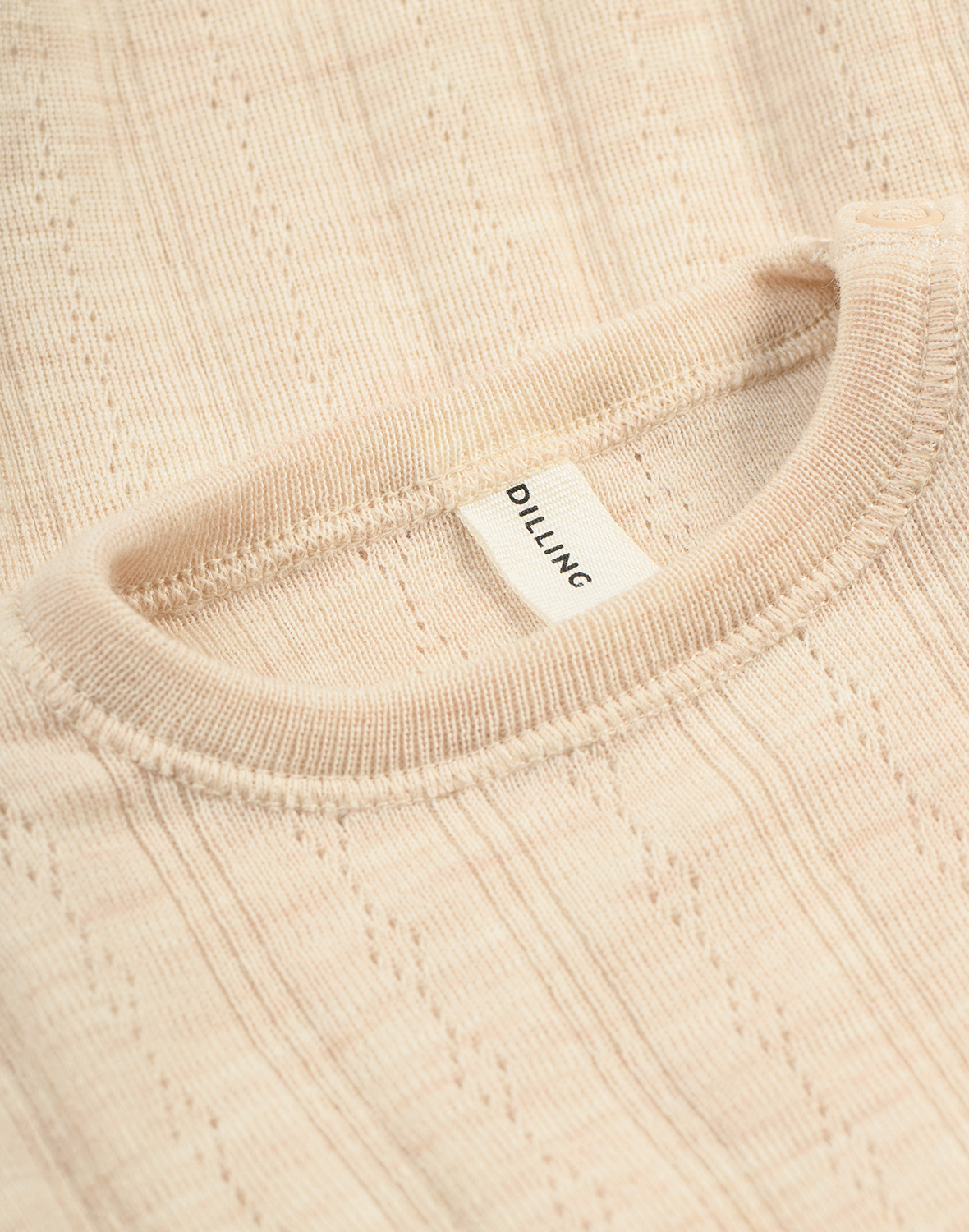 Pointelle romper met lange mouw van merinowol voor baby’s