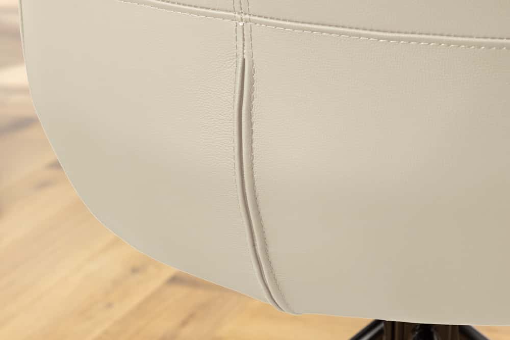 Drehbarer Design Stuhl SIGNATURE beige Echtleder 360° Taschenfederkern schwarz Metall
