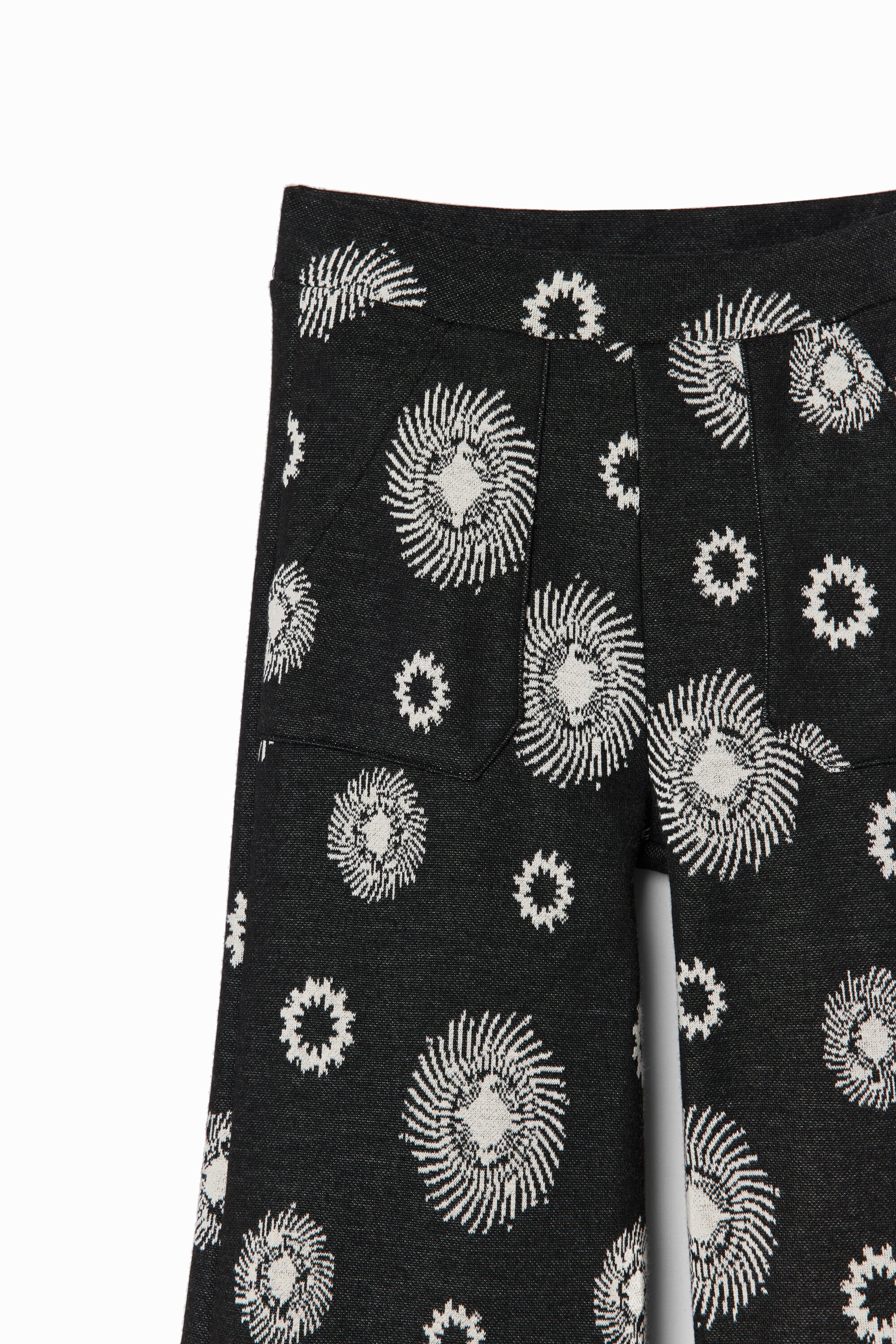 Calça flare geométrica