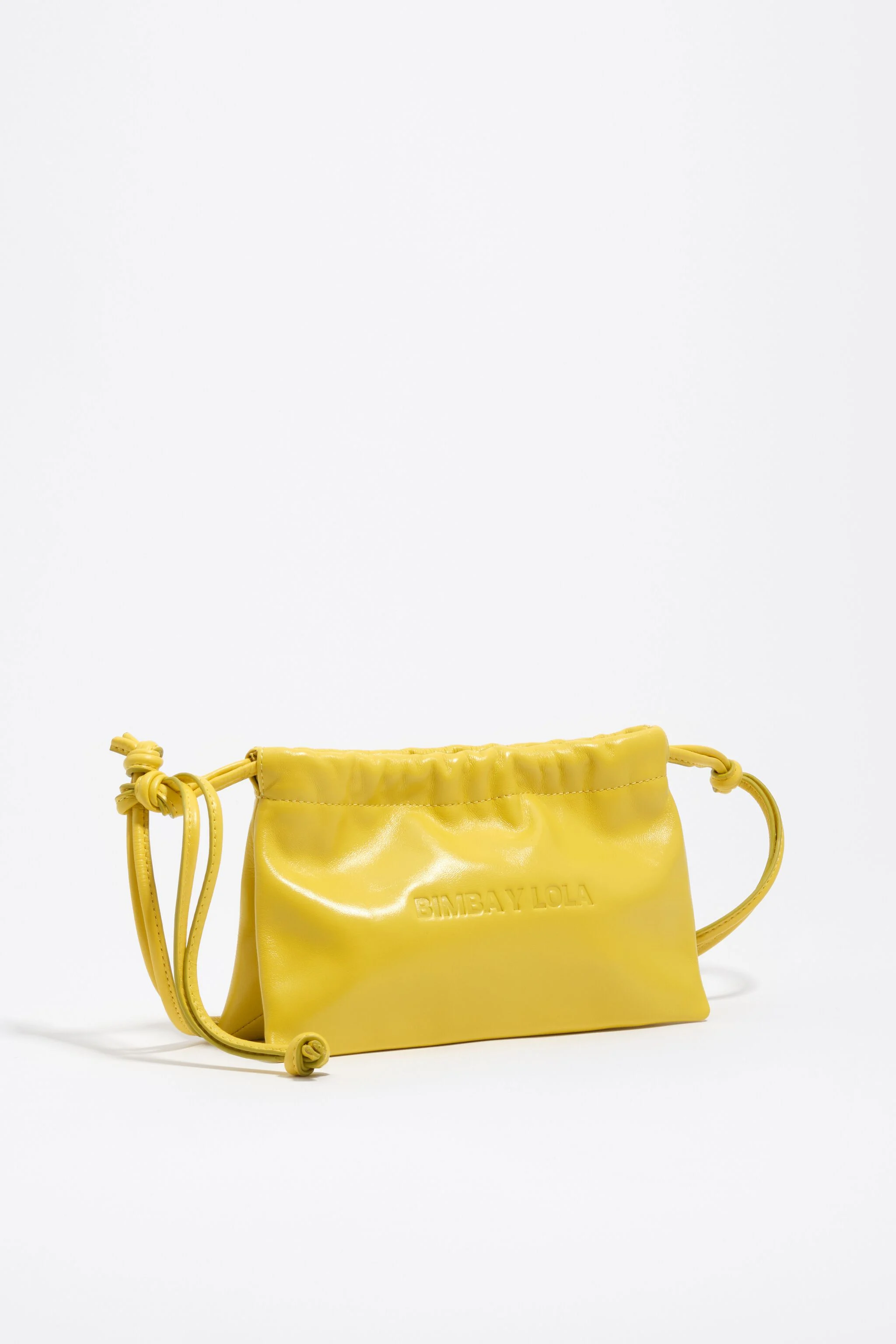 Mini bolsa de mão de couro amarelo