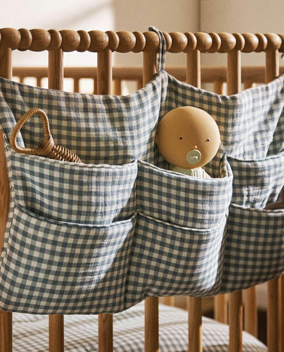 Organizador infantil em musselina de algodão com estampa de trevo