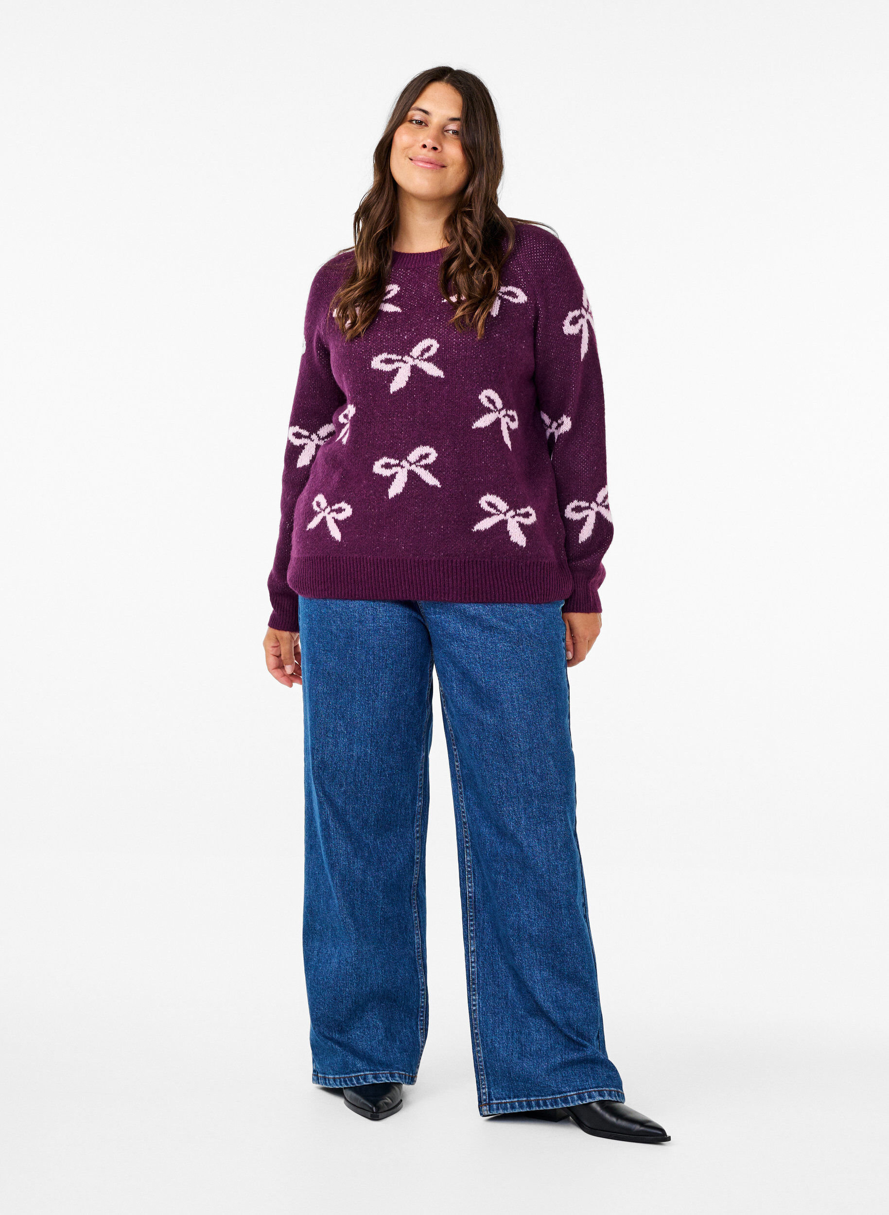 Strikbluse med sløjfer