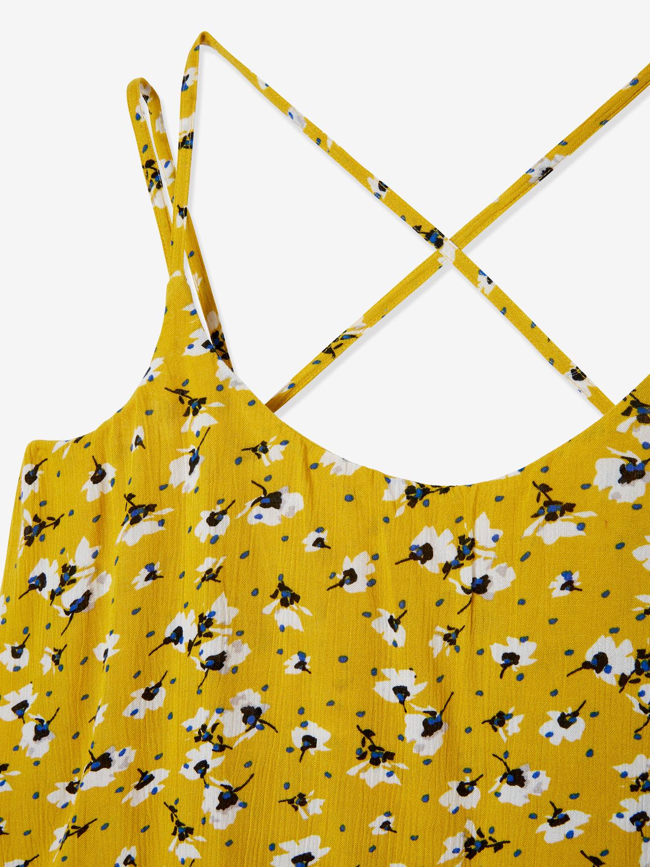 Vestido longo de maternidade com estampa amarela vibrante e detalhes de fantasia.