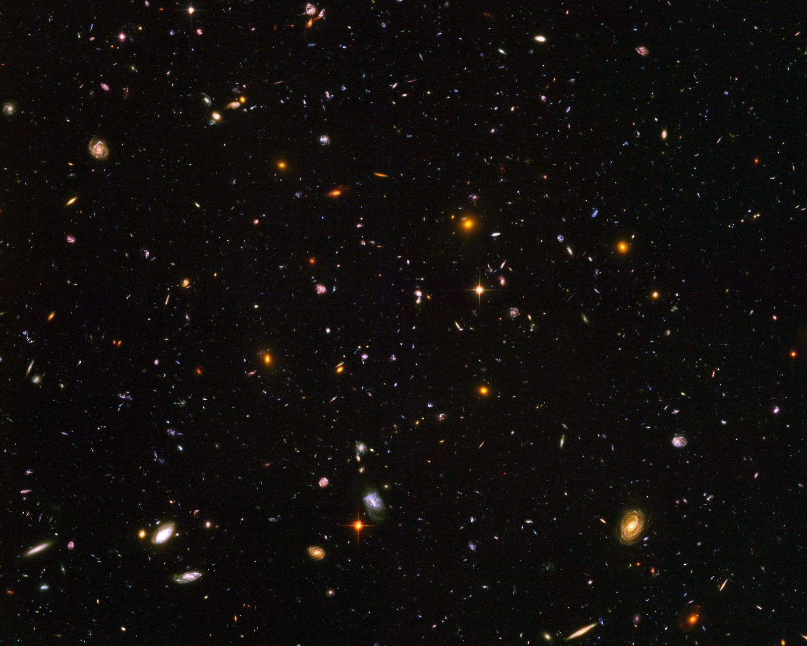 Galaxies galore (NASA/JPL - Caltech) by Hubble Telescope - Open Edition.