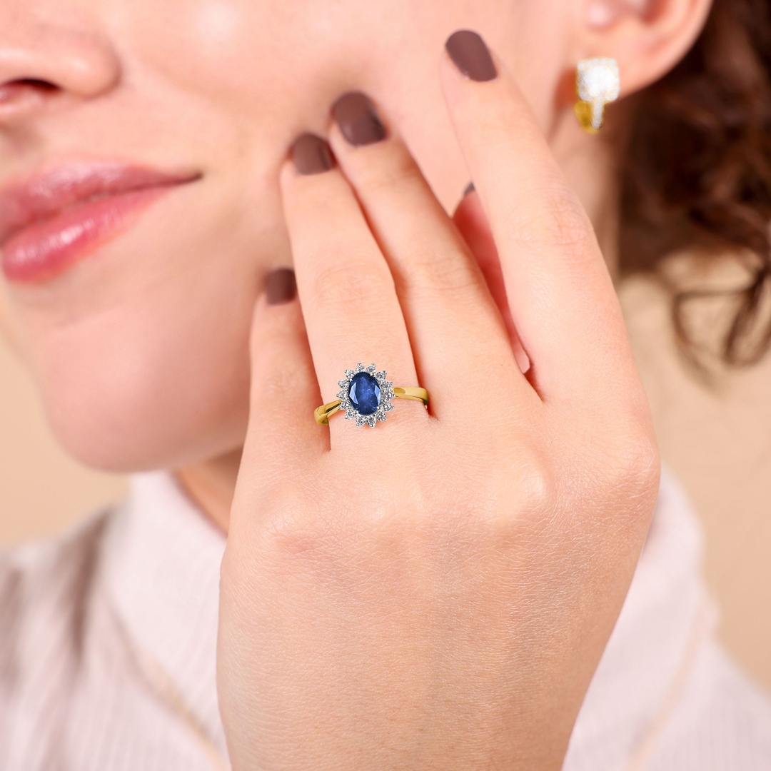 Damenring 750/18 K Gelbgold mit Saphir und Zirkonia