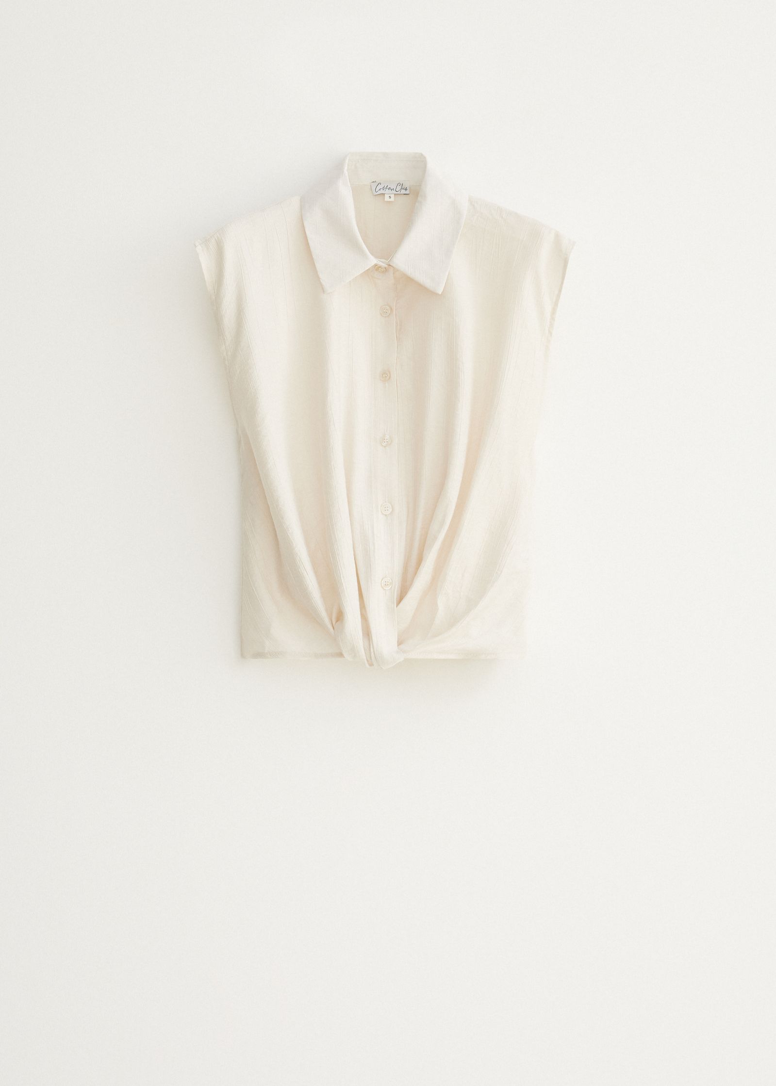 Mouwloze blouse met knoopdetail