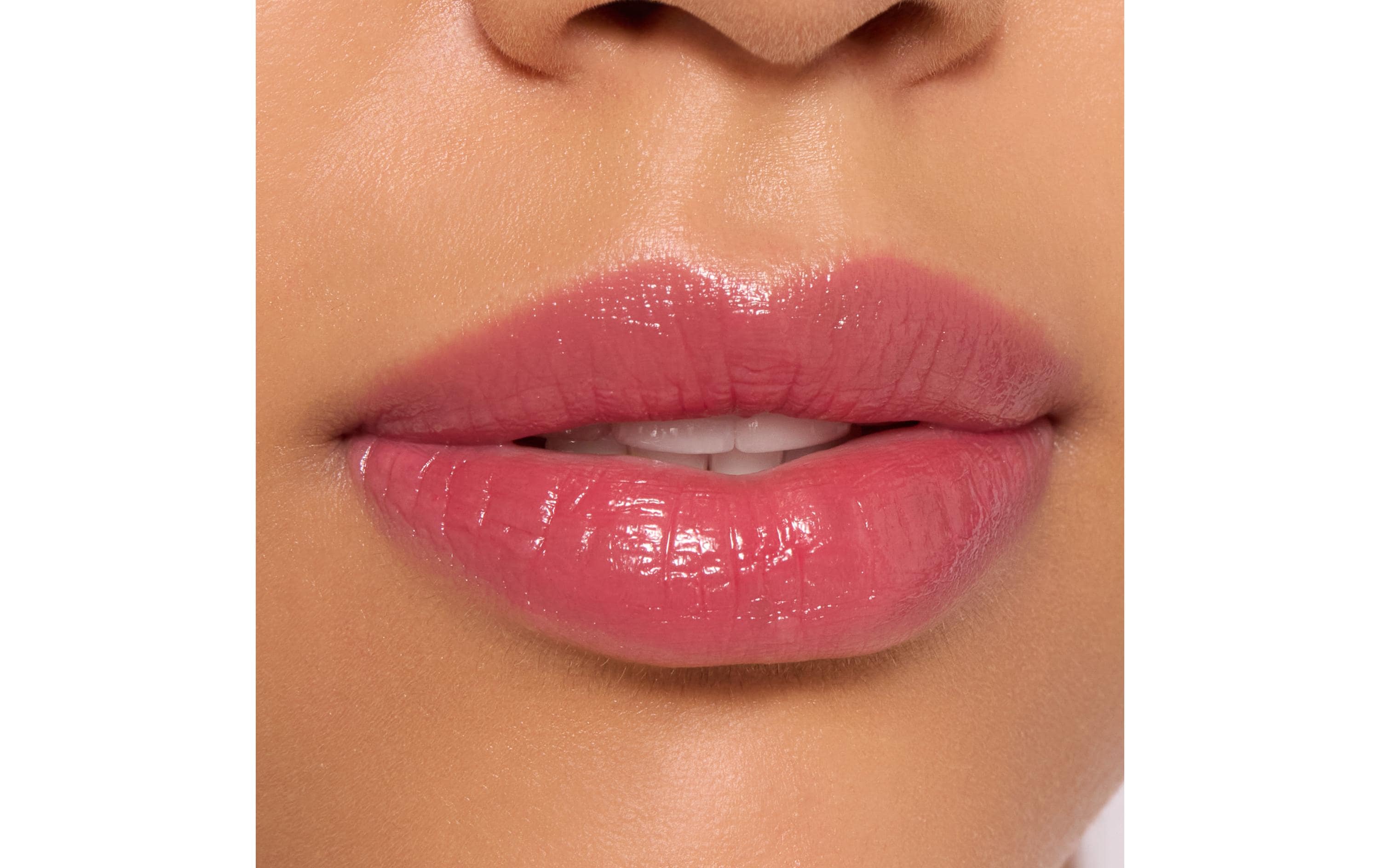 Lip Gloss Care In Colours 040 Hot TakeFarbiger Lippenbalsam in einem kühlen Rotton für glänzende Lippen