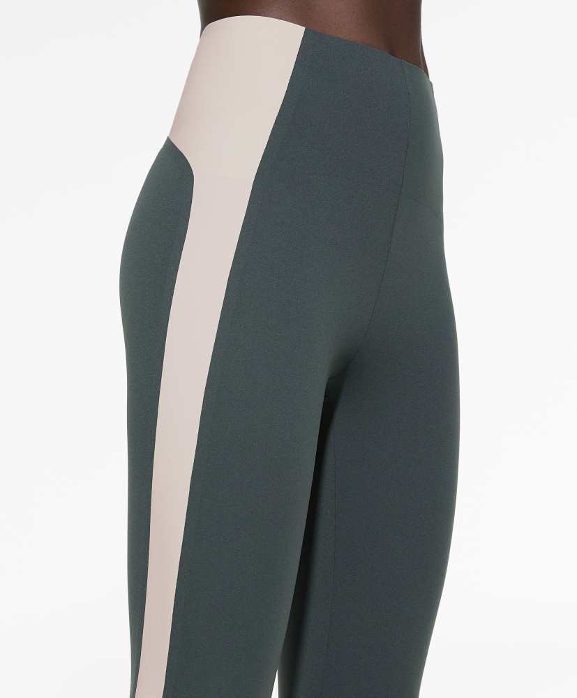 Leggings de compressão com blocos de cor até o tornozelo, 65 cm