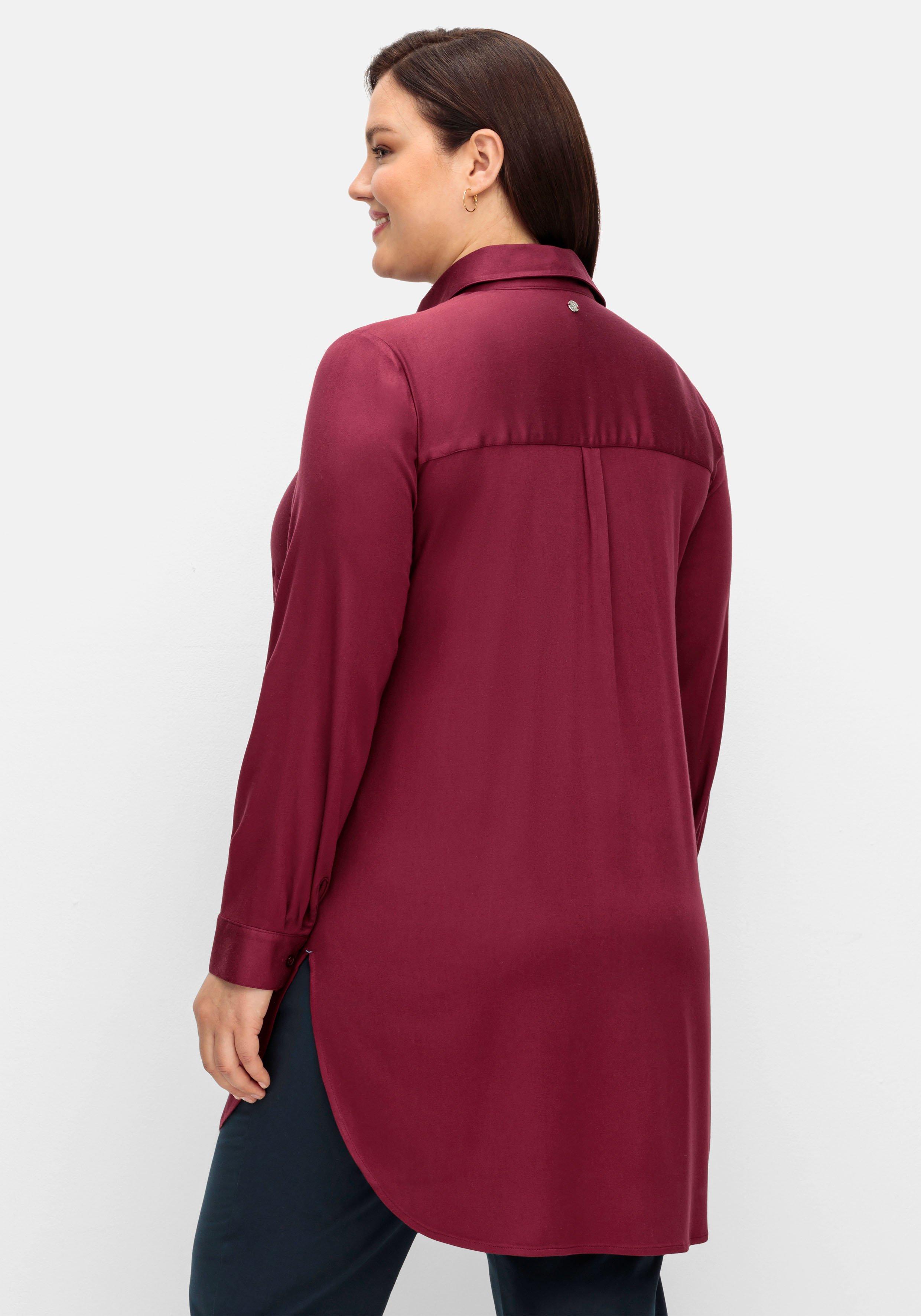 Leicht glänzende Longbluse mit gerundetem Saum