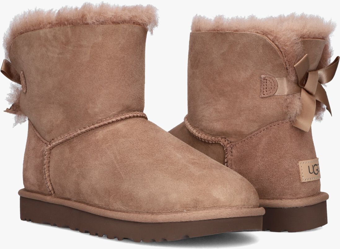bruine ugg vachtlaarzen classic mini baily bow