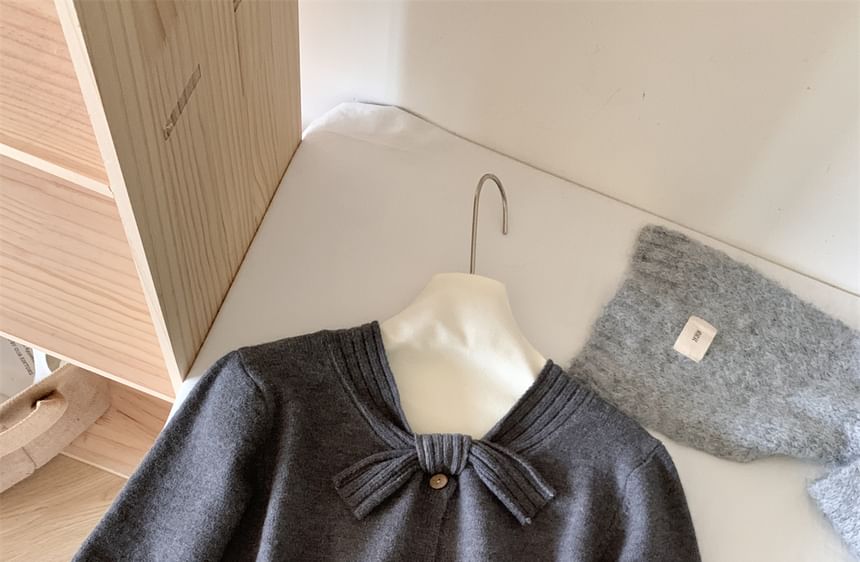 Dute - Effen vest met strikhals en knoopjes