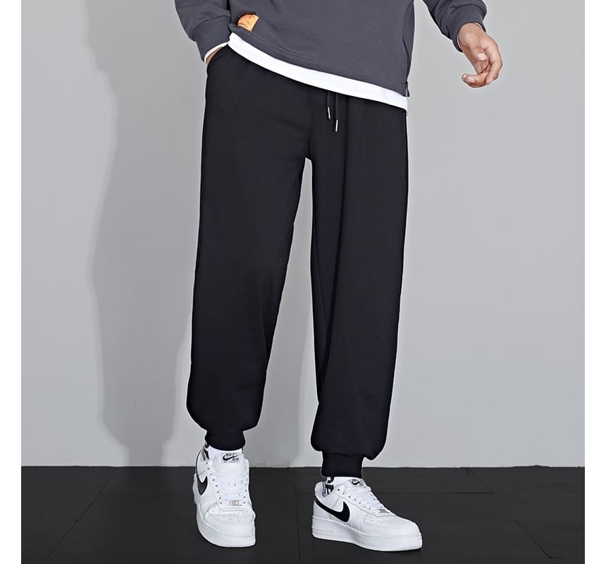 Acrius - Effen cropped harem-joggingbroek met trekkoord in de taille