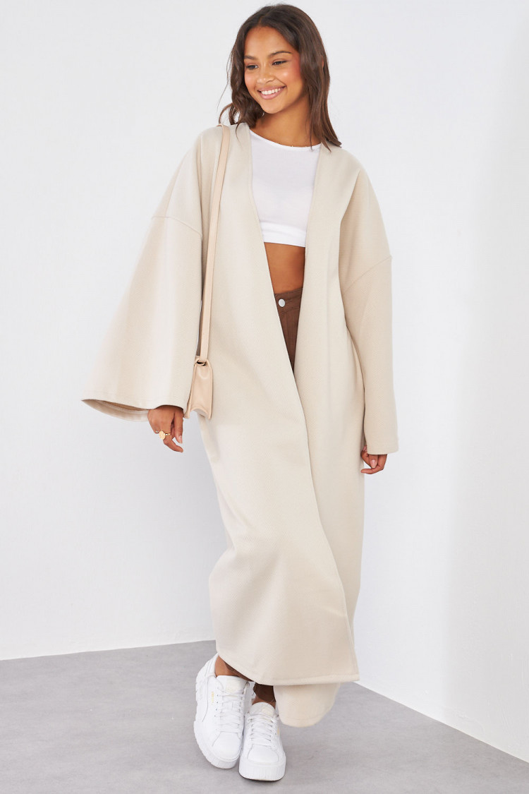 Manteau beige à manches amples