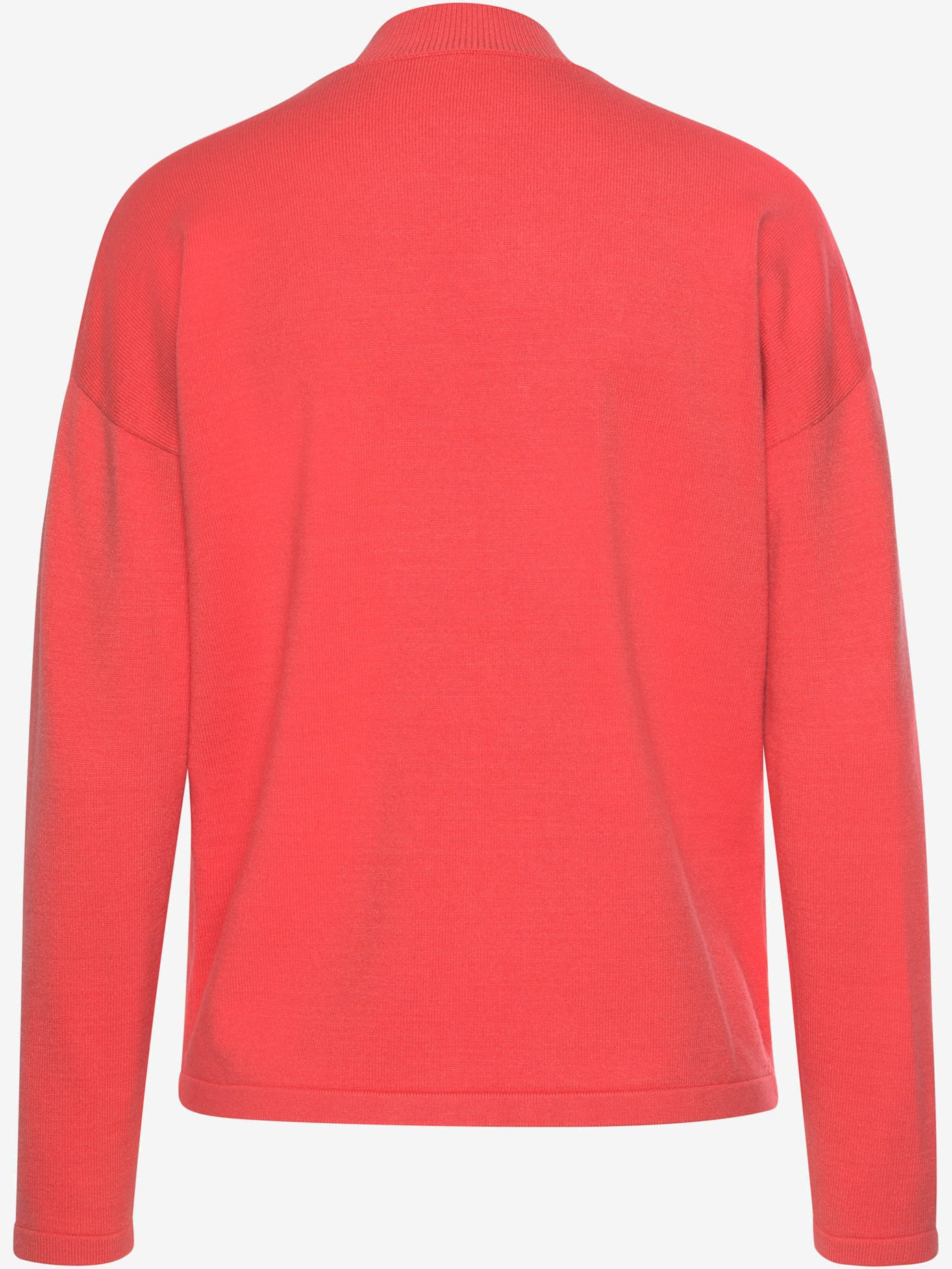 Pull en tricot application décorative devant