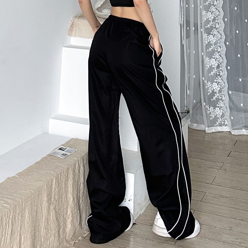 Trisica - Gestreepte joggingbroek met elastische taille en wijde pijpen